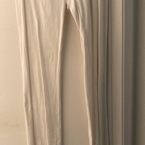 BeBe White LG Pants extremely wrinkled. Excellent condition. - Picture 2 of 4